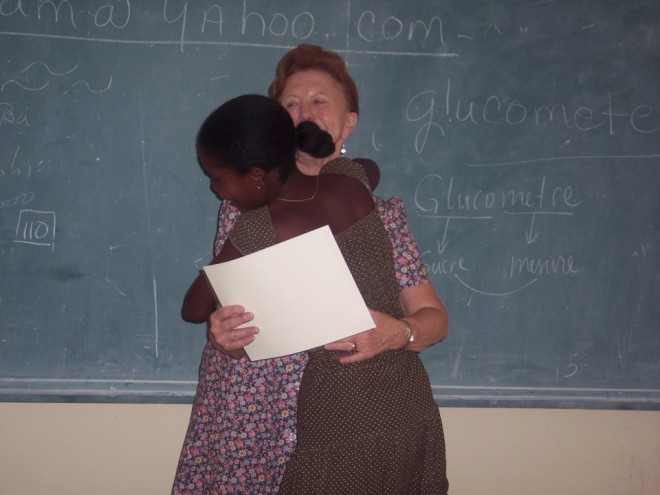 Gail with student in Haiti